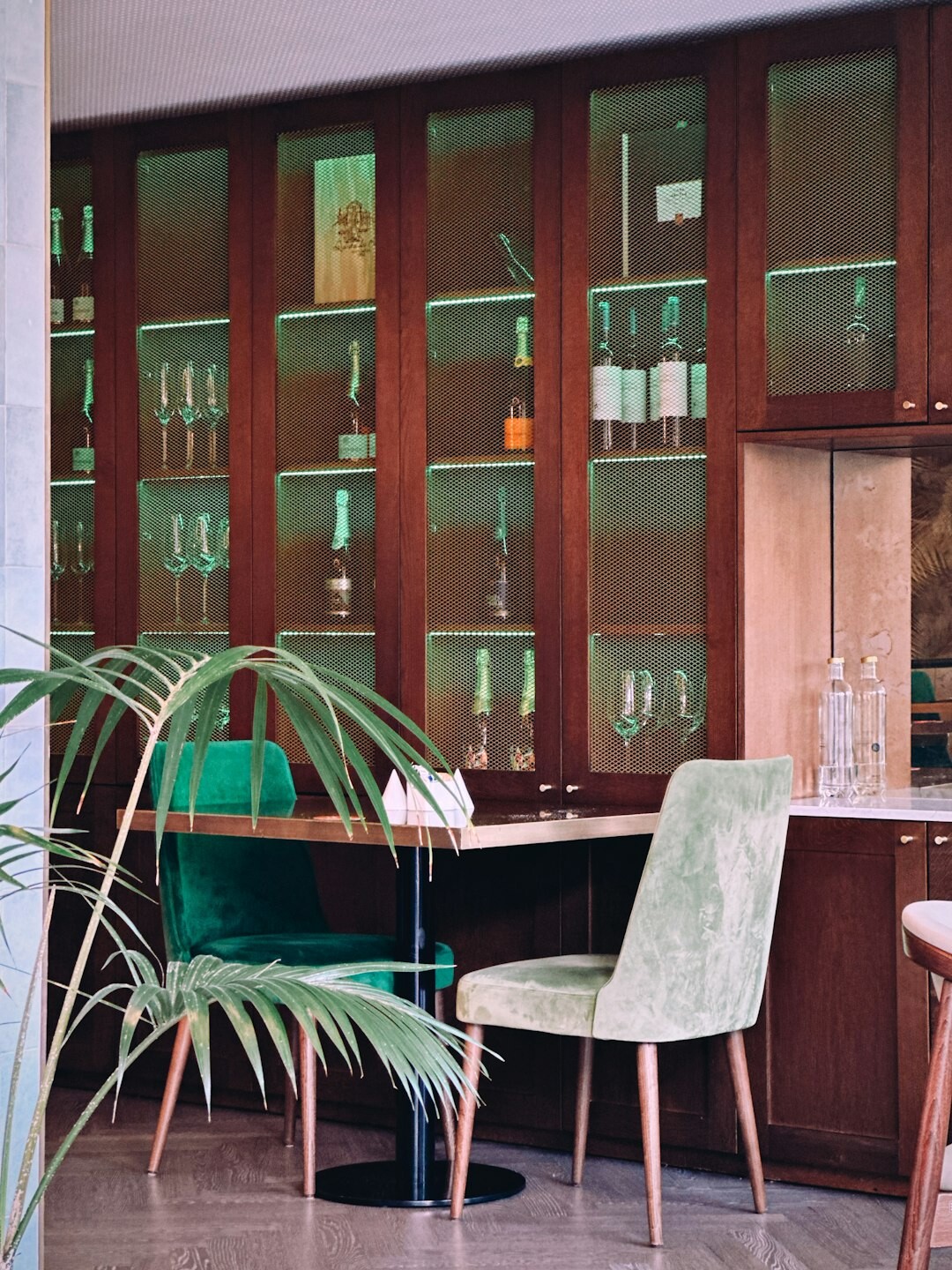 Private atelier viewing room interior with velvet seating and watch cabinets