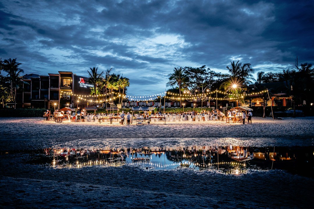 Elegant outdoor gala table setting at sunset on Playa Mansa